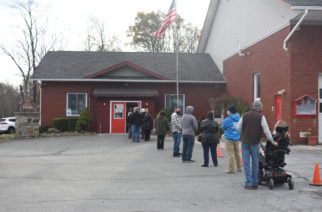 New York voters stand in line at the pollling place at the Walker Valley Fire House on the afternoon of November 3, 2020. Cones placed along the line encouraged voters to maintain social distance.